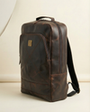 Genuine leather travel backpack with laptop compartment for women and men