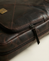 Genuine leather travel backpack with laptop compartment for women and men