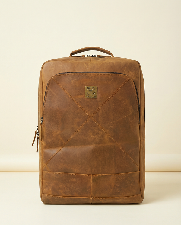 Full-grain leather backpack laptop and travel bag by Ya Qalbi