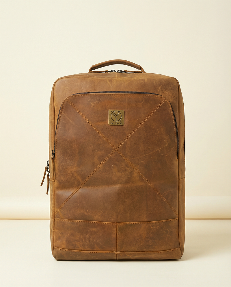 Full-grain leather backpack laptop and travel bag by Ya Qalbi