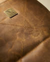 Premium leather travel backpack styled angle by Ya Qalbi