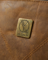 Brown leather travel backpack detail by Ya Qalbi