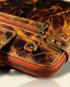 Expandable tan leather laptop bag for professionals by Ya Qalbi