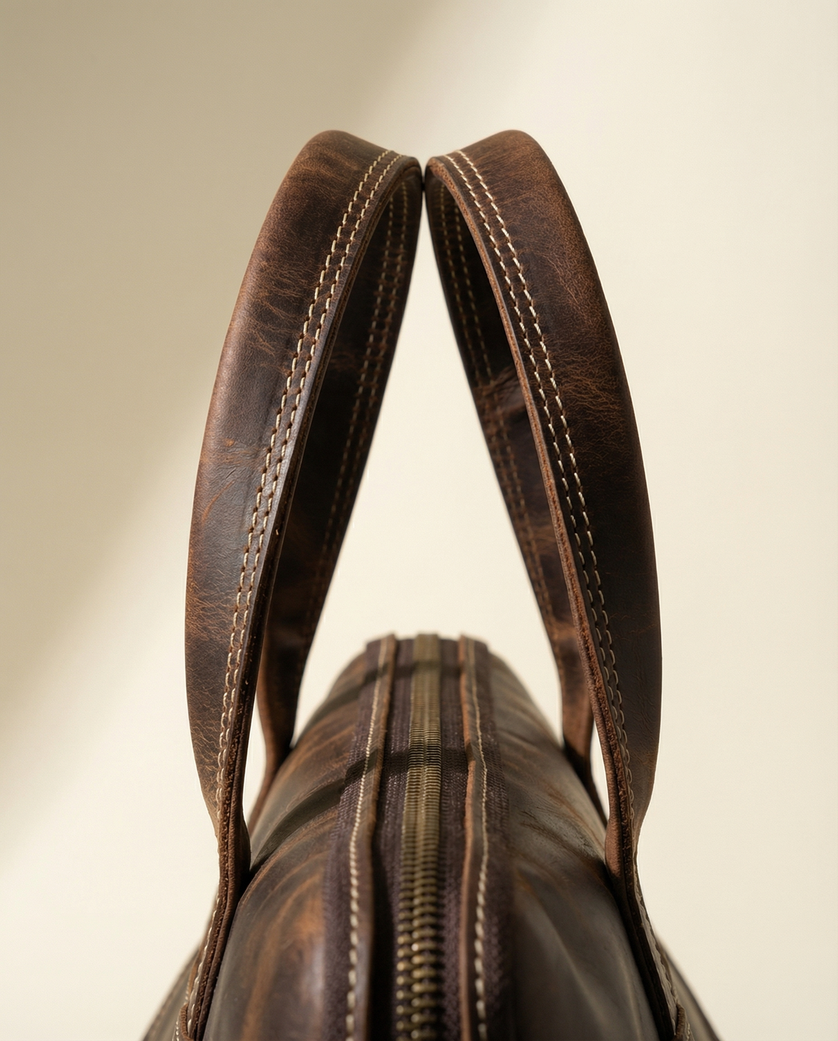 Close-up of rolled leather top handles