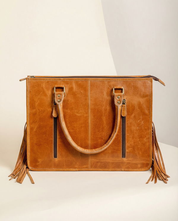 Full-grain leather Western tote with fringe detail by Ya Qalbi