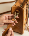 Western floral hand-tooled leather purse by Ya Qalbi