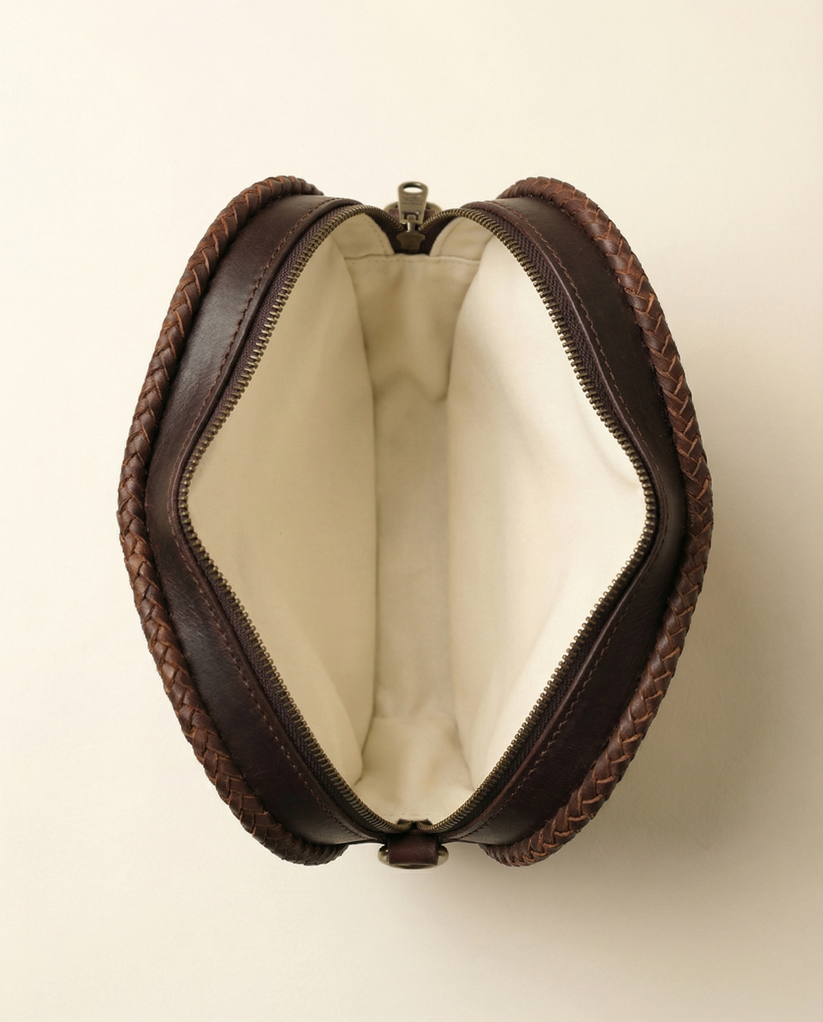 Hair-on cowhide heart sling bag side view by Ya Qalbi