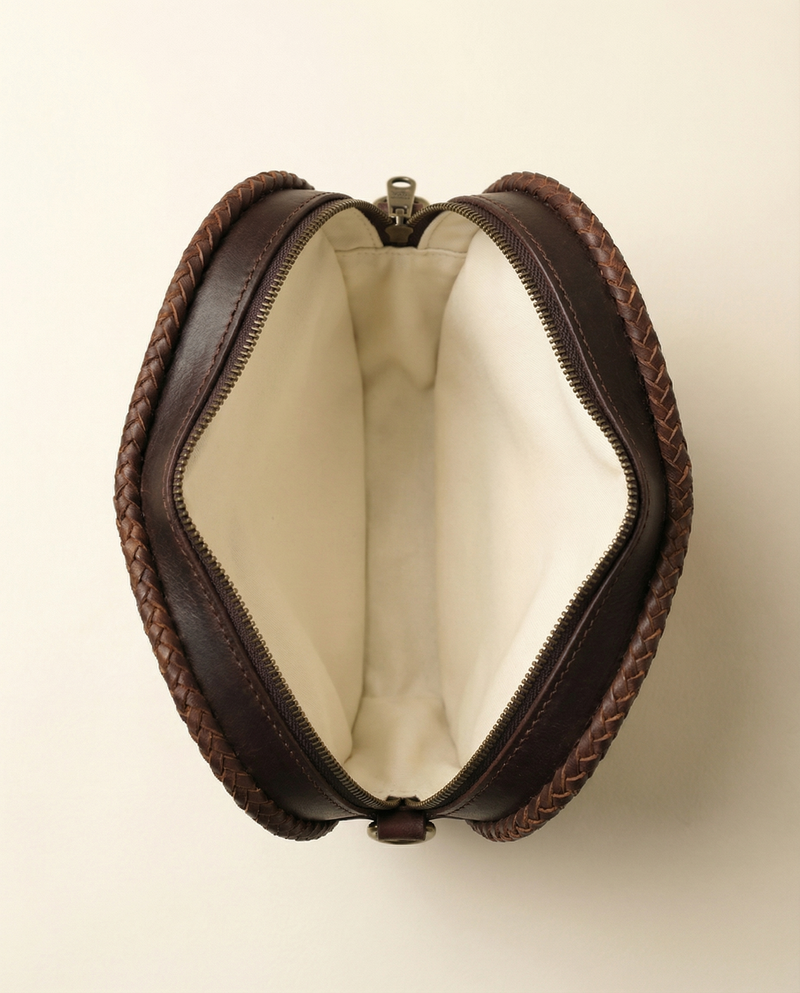 Hair-on cowhide heart sling bag side view by Ya Qalbi