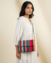 Vibrant leather crossbody sling closeup by Ya Qalbi