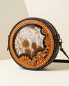 Hair-on leather round canteen crossbody sling by Ya Qalbi