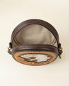 Hand-carved hair-on leather sling bag by Ya Qalbi