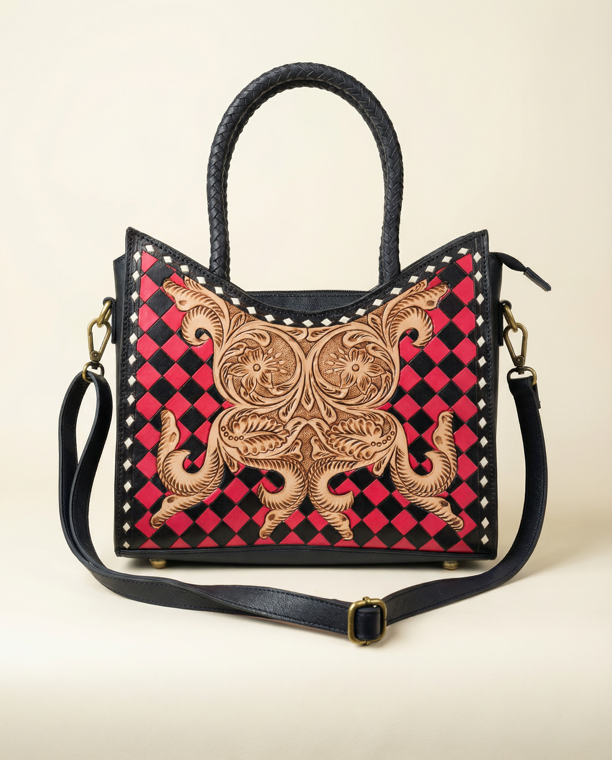 Red and black checkerboard hand-tooled leather tote by Ya Qalbi