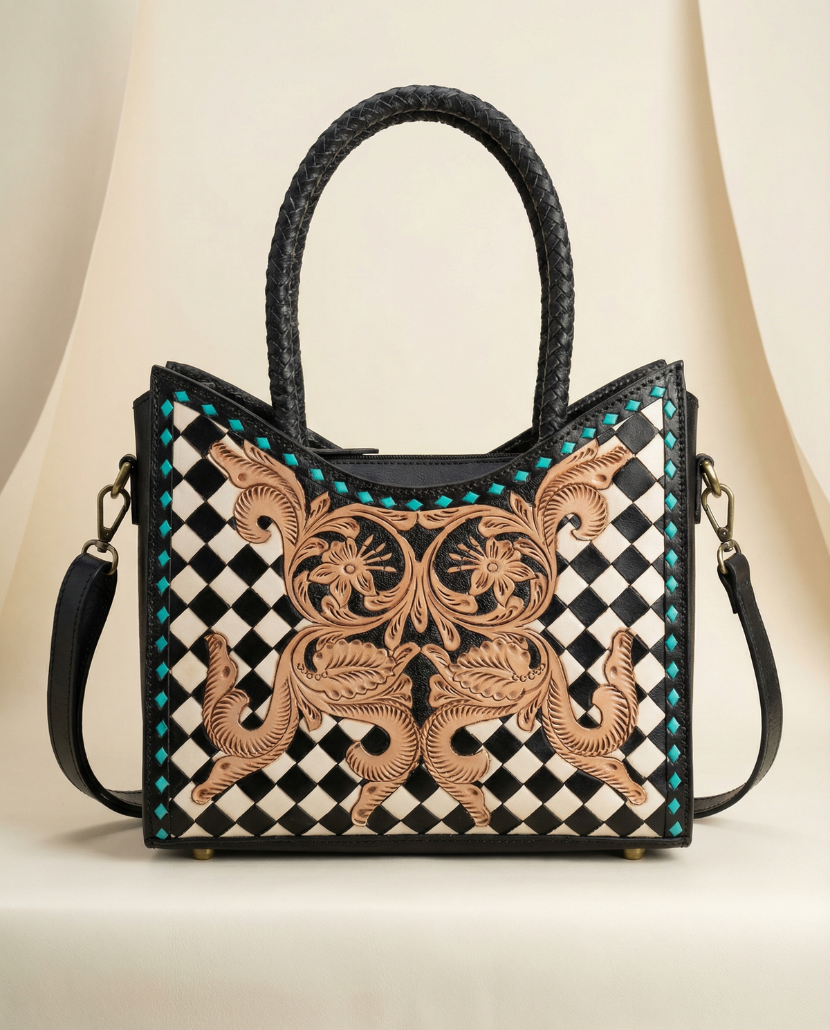 Black and white checkerboard hand-tooled leather tote by Ya Qalbi