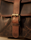 Brass lock leather backpack side view by Ya Qalbi