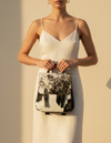 Black and White Hair-On Leather Flap Backpack – Brass Buckles