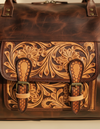 Hand-tooled leather travel bag artisan detail by Ya Qalbi