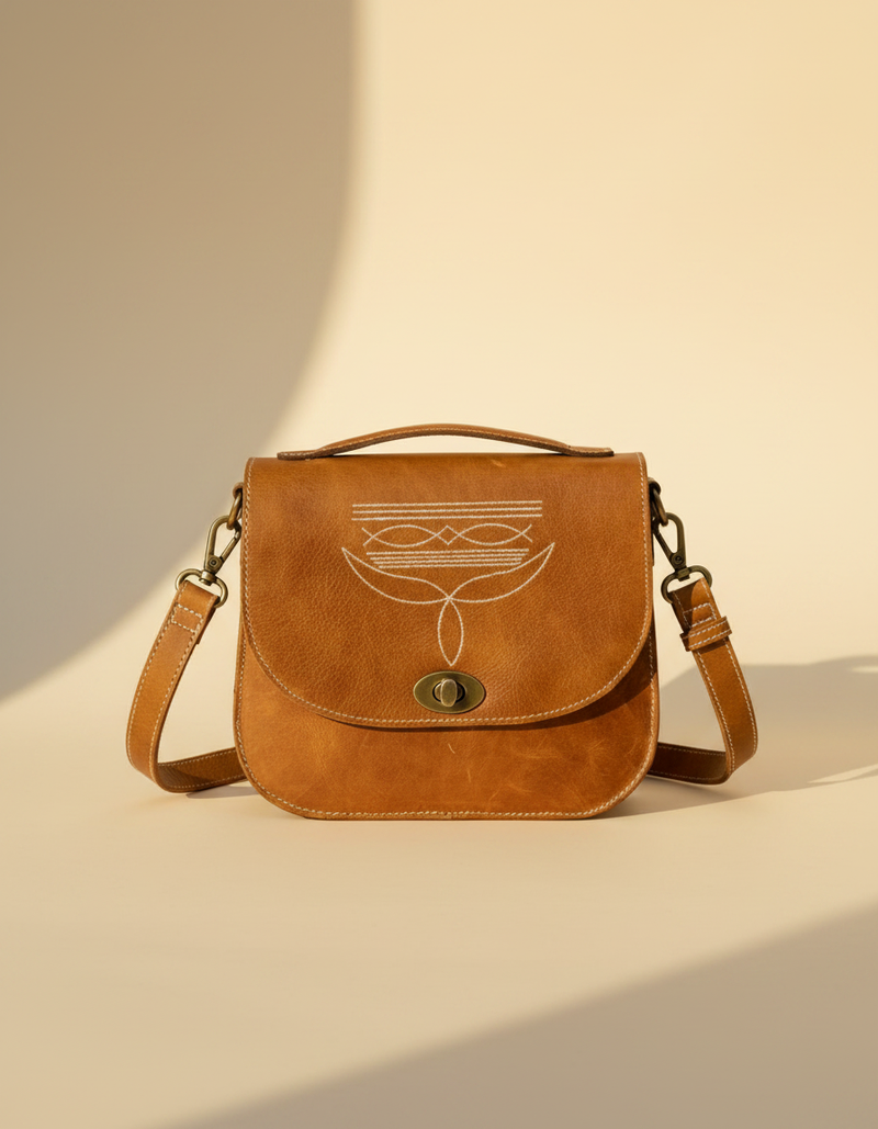 Tan Leather Bootstitch Saddle Bag – Twist-Lock Flap and Top Handle