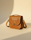 Tan Leather Bootstitch Saddle Bag – Twist-Lock Flap and Top Handle