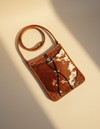 Brown Hair-On Leather Crossbody – Hand-Tooled Corners and Concho