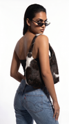 Reversible cowhide tote bag side view by Ya Qalbi