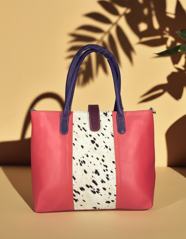 Colorful hair-on leather tote bag with brass lock and pet compartment by Ya Qalbi