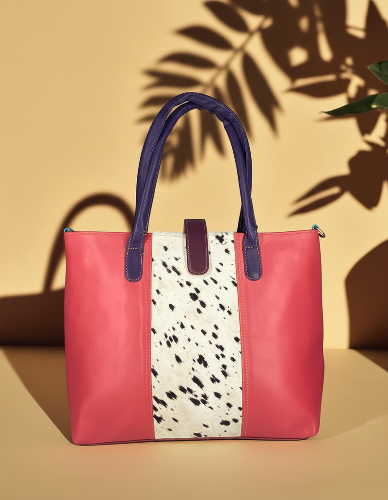 Colorful hair-on leather tote bag with brass lock and pet compartment by Ya Qalbi