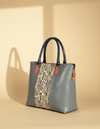 Sustainable boho leather tote bag in vibrant colors by Ya Qalbi