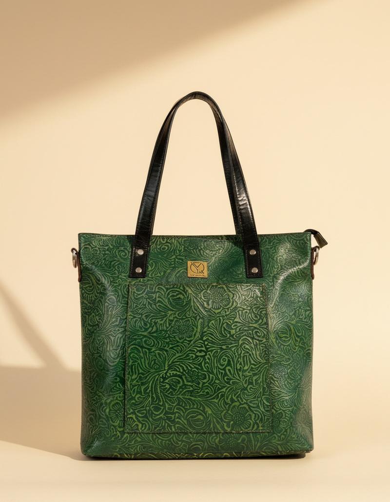 Black full-grain leather tote bag with zipper closure by Ya Qalbi