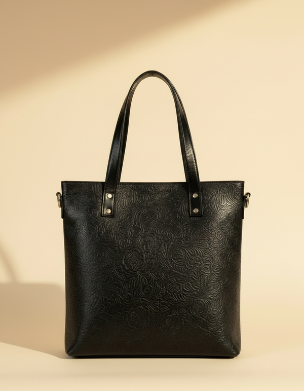 Full-grain leather work tote with padded laptop pocket by Ya Qalbi