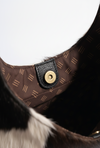Two-in-one reversible leather tote bag with natural cowhide texture by Ya Qalbi