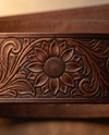 Full grain brown leather belt with scroll feather carving and antique brass buckle
