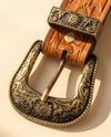 Handmade cowboy belt with diamond, sunburst, and tribal motifs