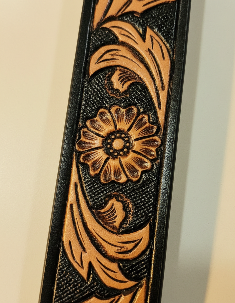 Full grain black leather belt with tan floral tooling and antique brass buckle