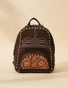 Dark brown suede backpack with white boot stitch embroidery, buckstitch lacing and tooled leather floral front pocket