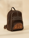 Dark brown suede backpack with white boot stitch embroidery, buckstitch lacing and tooled leather floral front pocket
