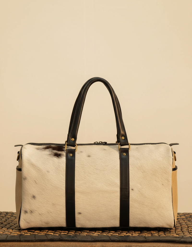 Cream Hair-On Duffle – Black Leather Straps & Sand End Panels