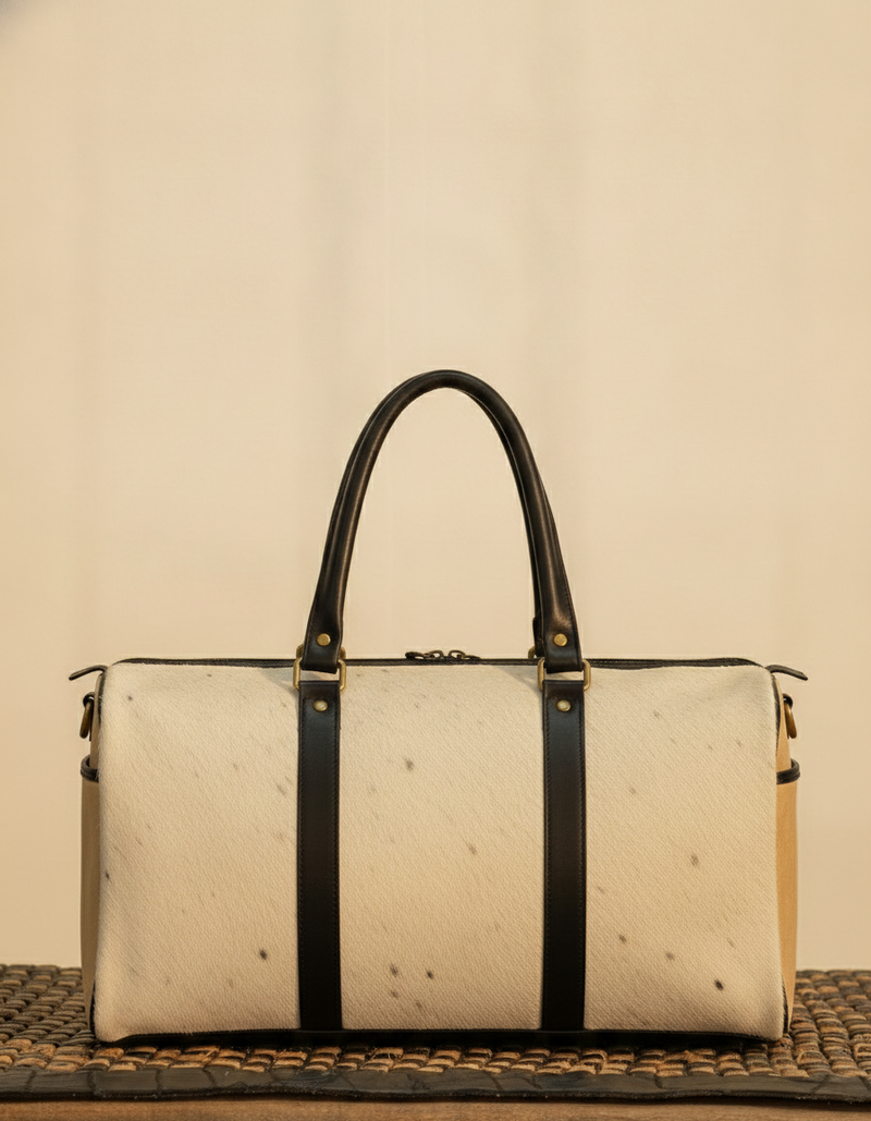 Cream Hair-On Duffle – Black Leather Straps & Sand End Panels
