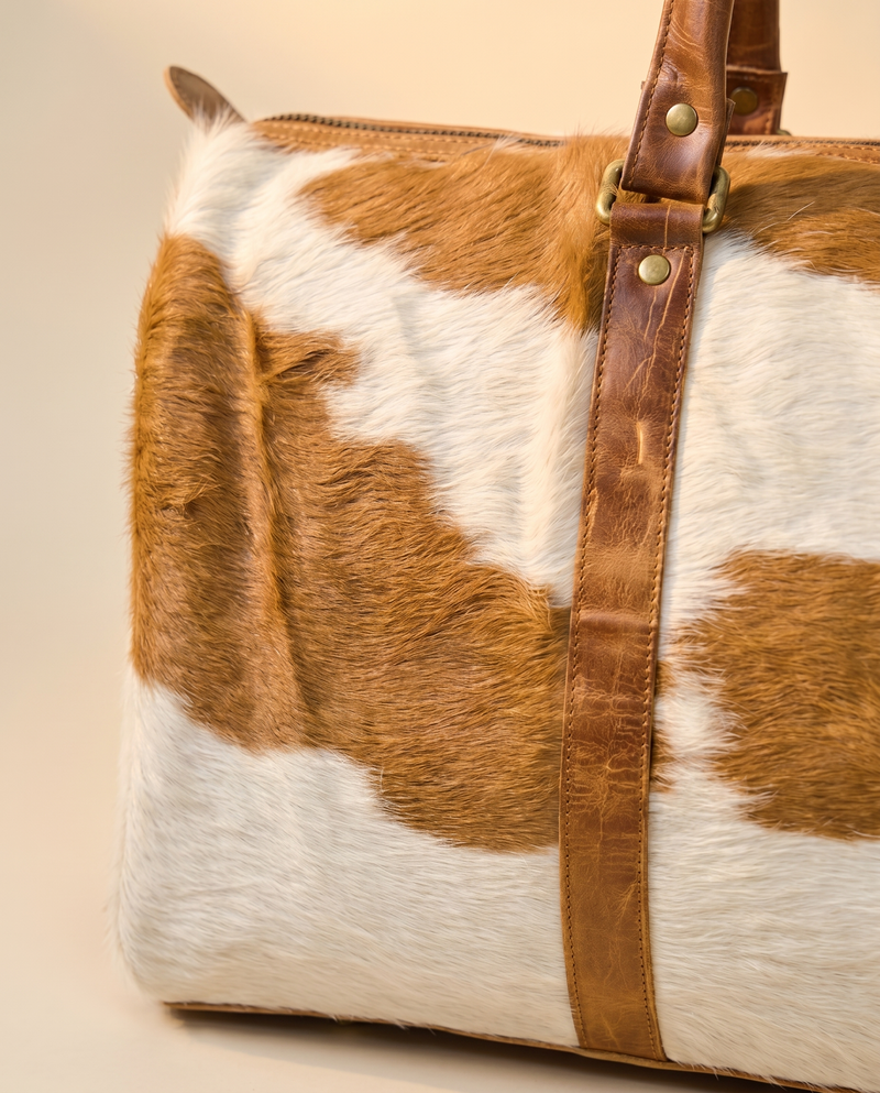Tan and White Hair-On Duffle – Distressed Tan Leather Base