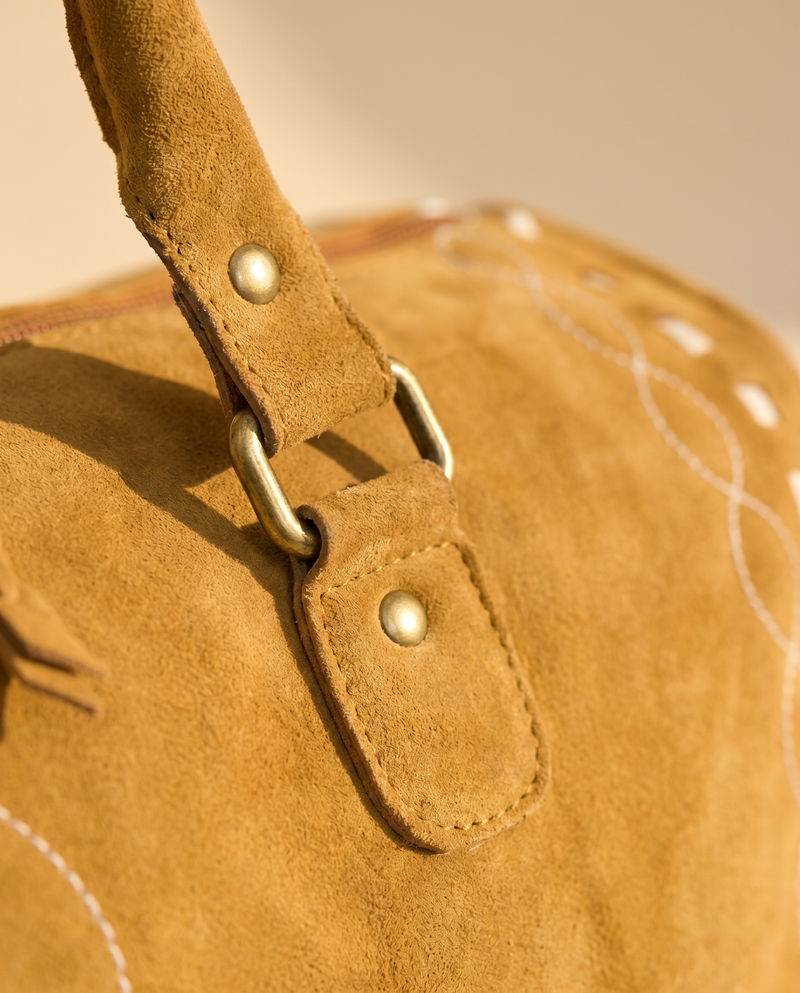 Tan Suede Bootstitch Duffle – Buckstitch Edges & Braided Pulls