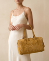 Tan Suede Bootstitch Duffle – Buckstitch Edges & Braided Pulls
