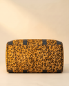 Golden Leopard Print Hair-On Duffle – Black Bands & Silver Hardware