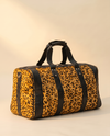 Golden Leopard Print Hair-On Duffle – Black Bands & Silver Hardware