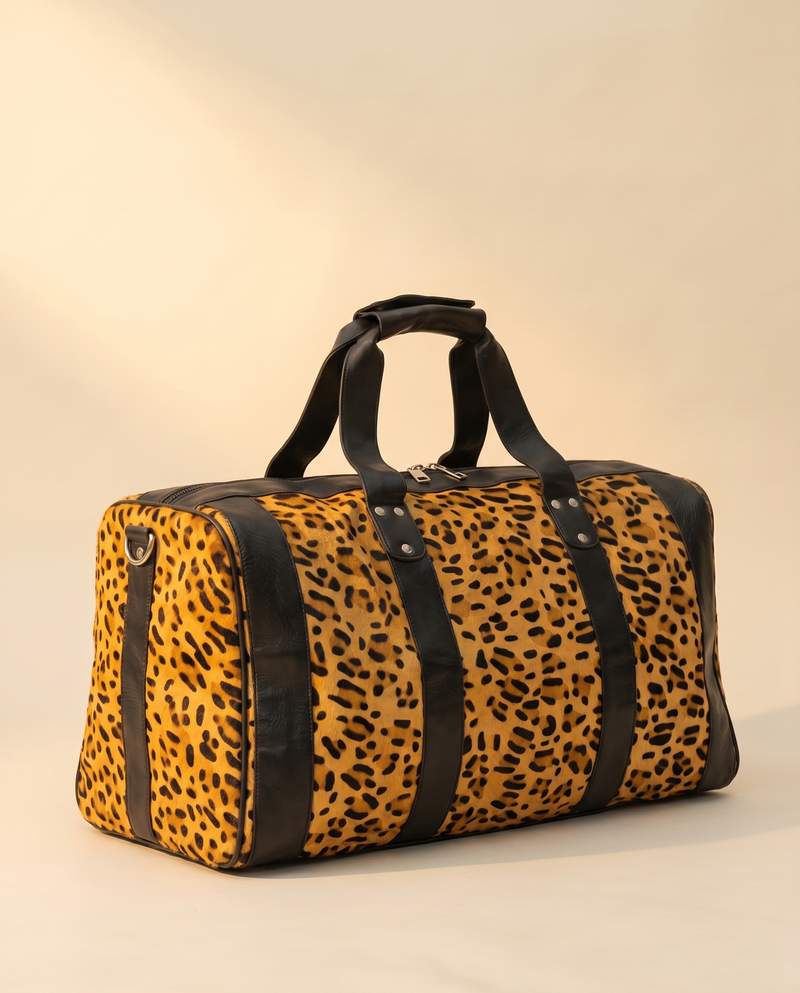 Golden Leopard Print Hair-On Duffle – Black Bands & Silver Hardware