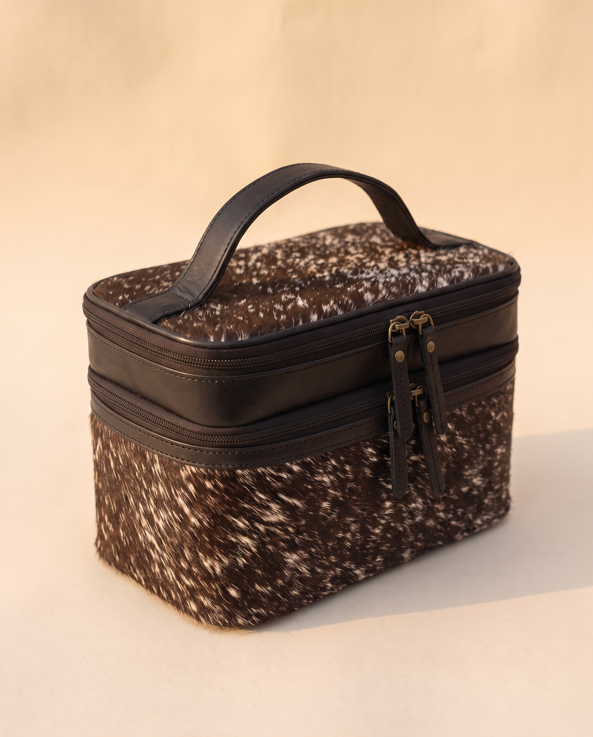 Salt and pepper hair-on makeup case, angled