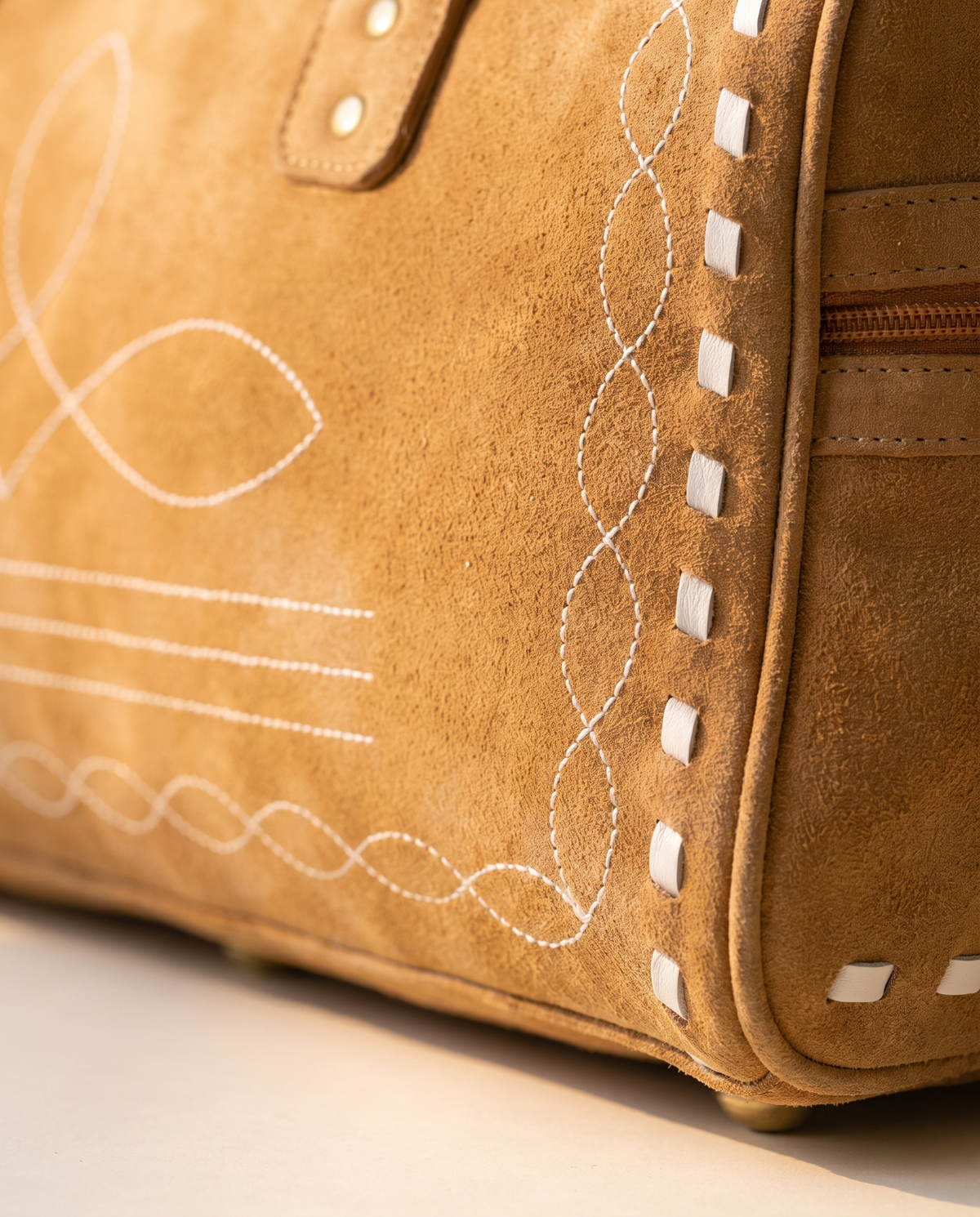 Brown Suede Bootstitch Barrel Bag – White Buckstitch Trim