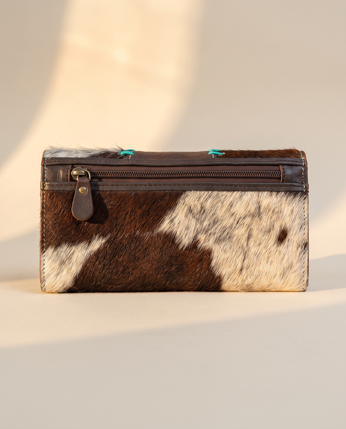 Brown and Turquoise cowhide wallet with bootstitch leather panel, back view, by Ya Qalbi