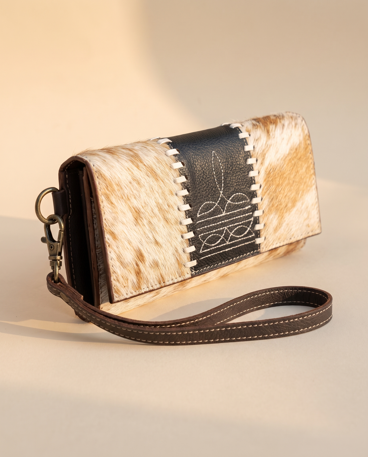 Tan and Black cowhide wallet with bootstitch leather panel, front view, by Ya Qalbi