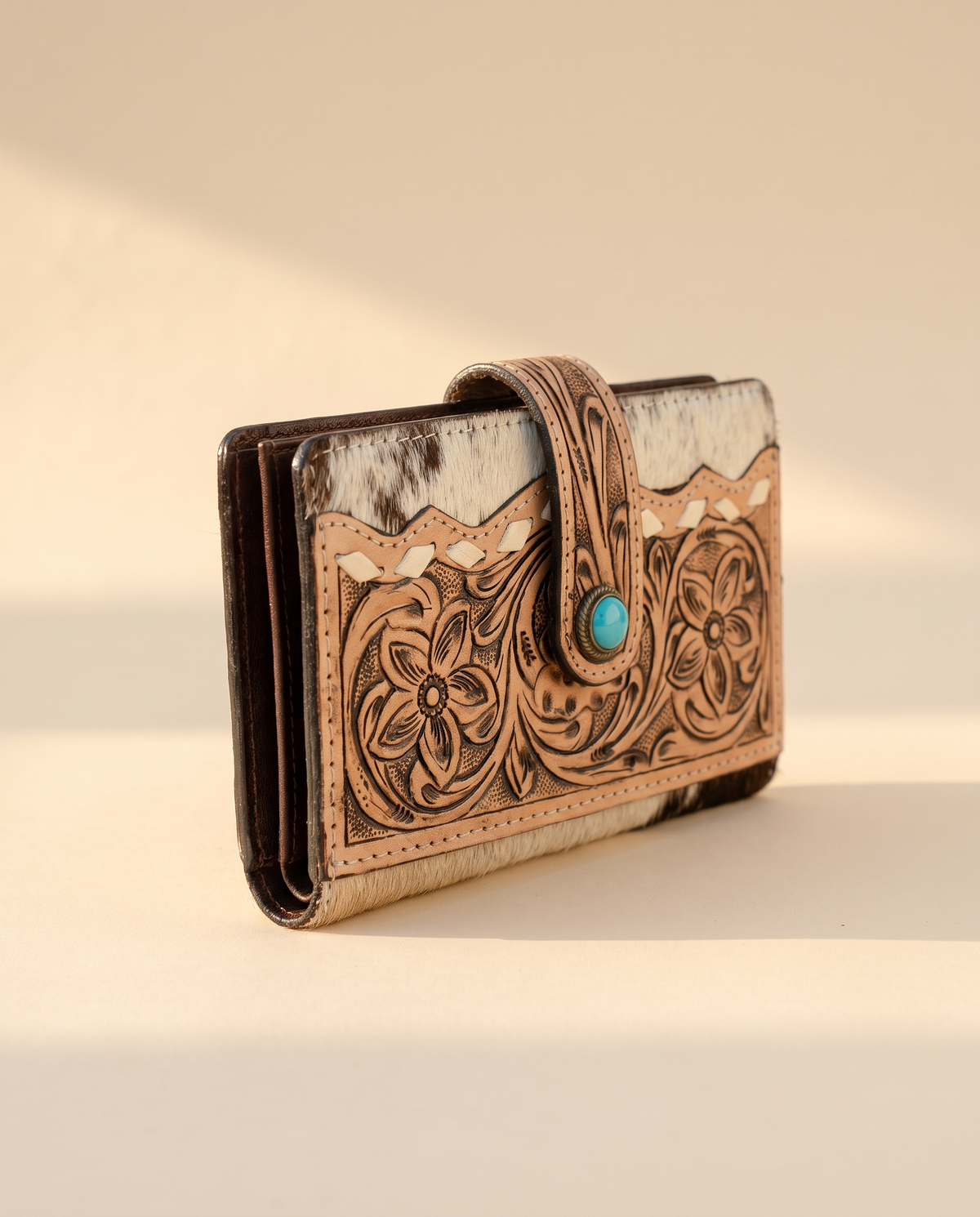 Hand-tooled leather wallet with turquoise stone tab, front view, by Ya Qalbi