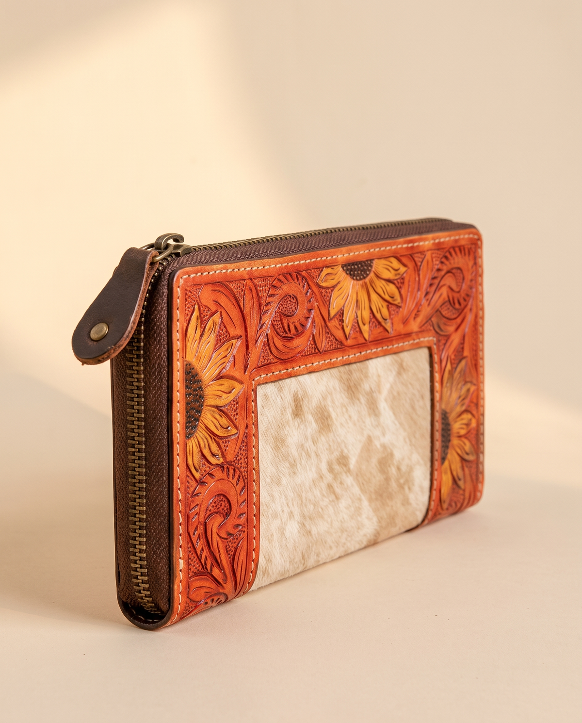 Sunflower painted hand-tooled zip wallet with cowhide, angled view, by Ya Qalbi