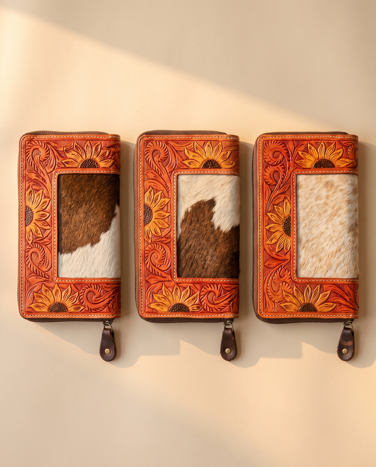 Sunflower painted hand-tooled zip wallet with cowhide, group shot of colourways, by Ya Qalbi